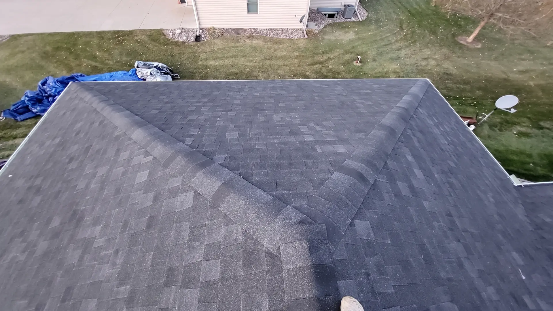 Overhead view of asphalt shingle roofing by Onsite Contractors